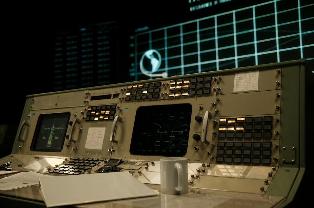 Television broadcast control room with multiple video screens